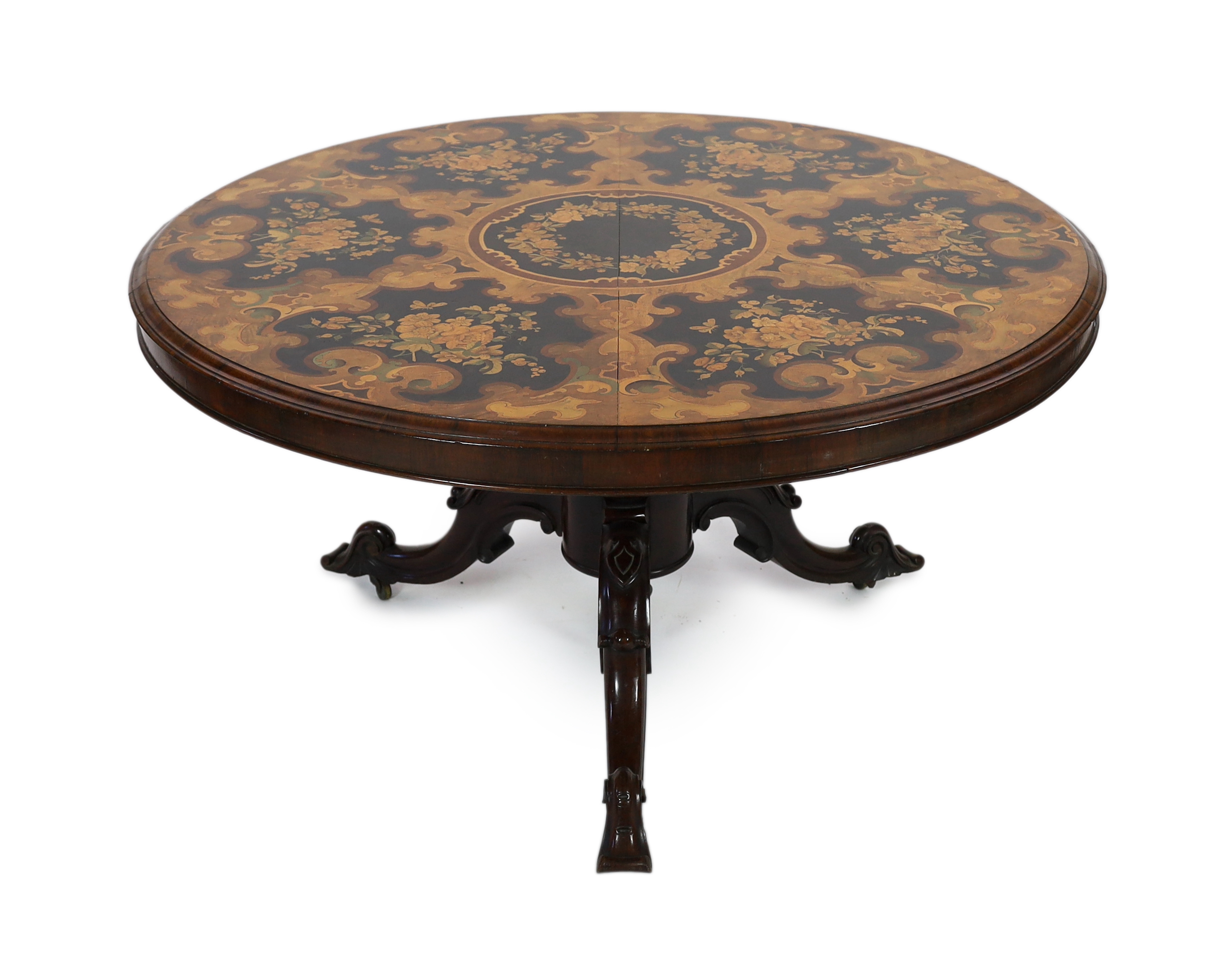A Victorian and later marquetry inlaid walnut and rosewood breakfast table, diameter 132cm, height 74cm